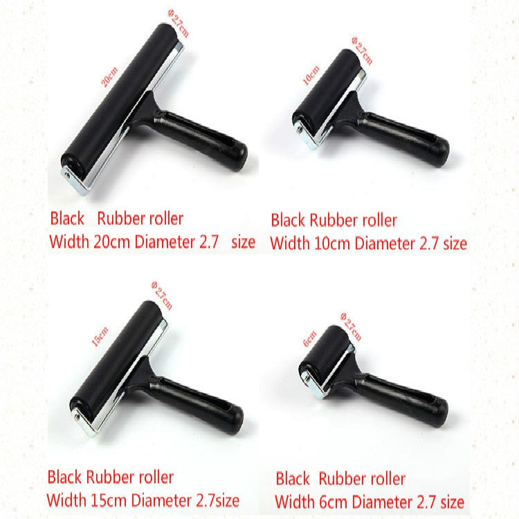 Assorted black rubber roller printing tools with metal holders in four sizes