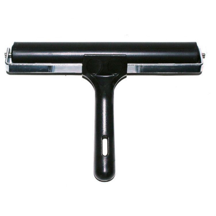 Black handheld rubber ink roller tool with long roller bar and metal frame