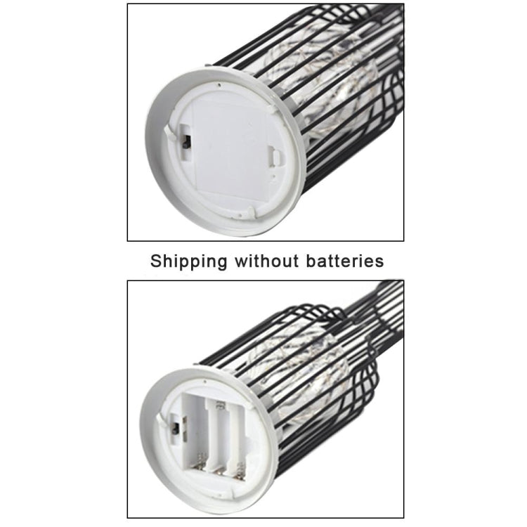 LED lamp battery compartment view inside a wire cage lantern tube