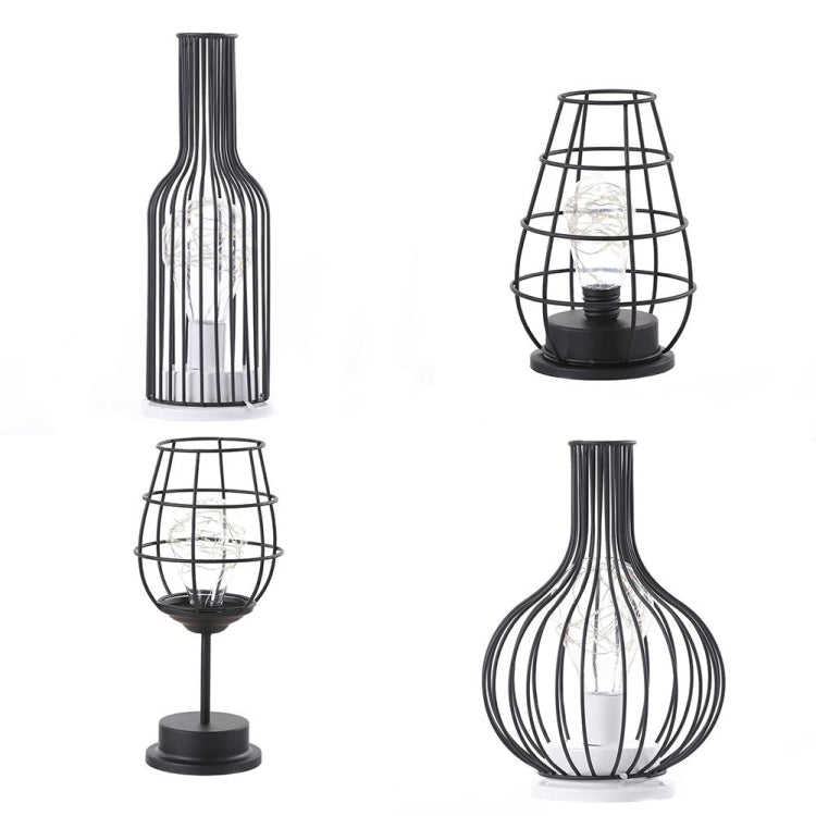 Wine bottle and wire cage LED table lamps shown isolated on a white background