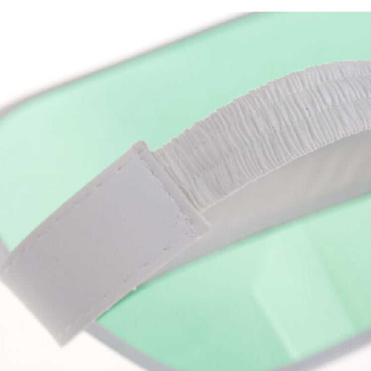 Close-up of white PVC visor cap strap with stitched seam and elastic band
