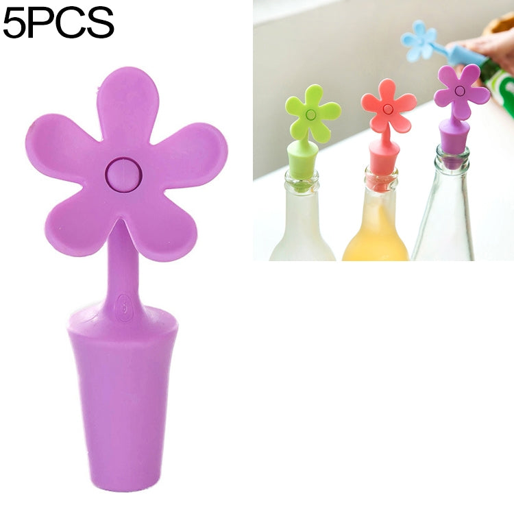 Purple flower-shaped silicone bottle stopper with round seal opening on a stem