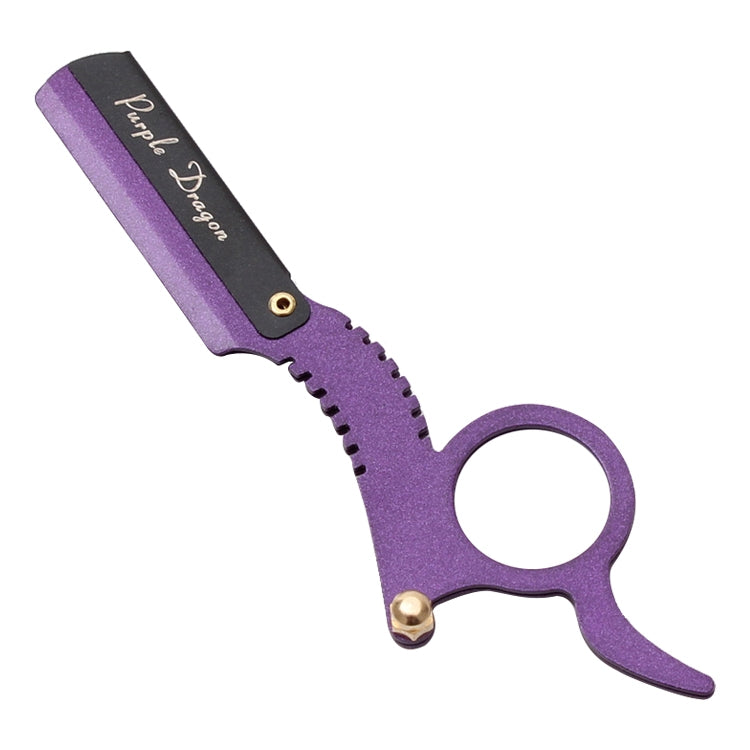 Purple thumb razor with black blade guard, serrated grip, and round finger loop.