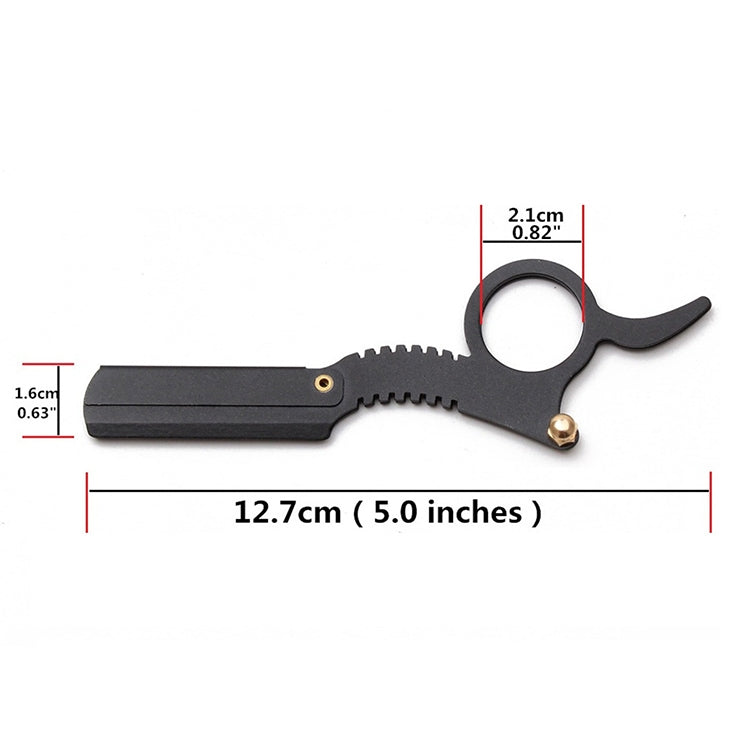 Black vintage thumb razor with curved finger loop handle and visible gold rivets.