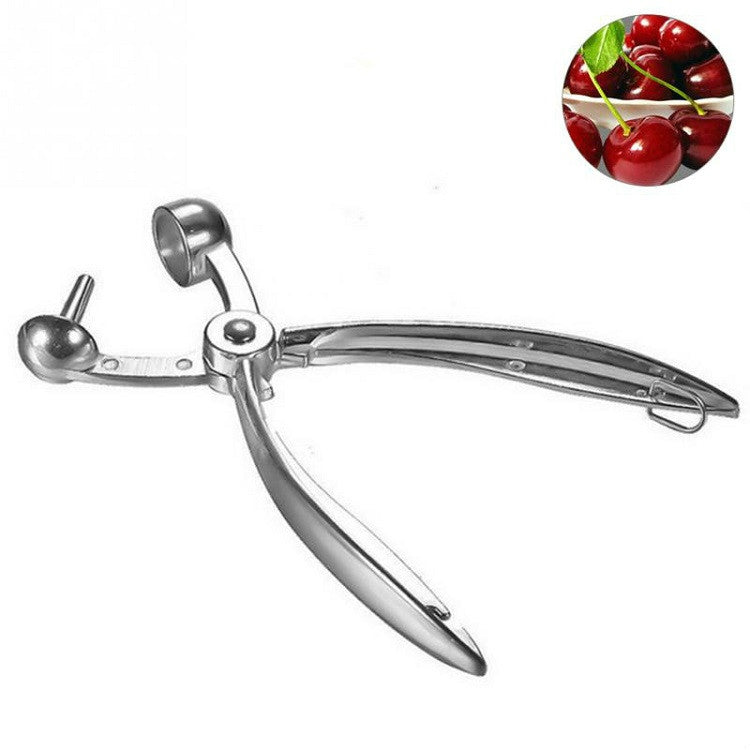 Stainless steel cherry corer tool with curved blades, pull ring, and catcher cup