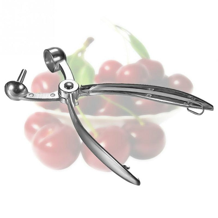 Stainless steel cherry corer with bent arms, pull handle ring, and curved prongs