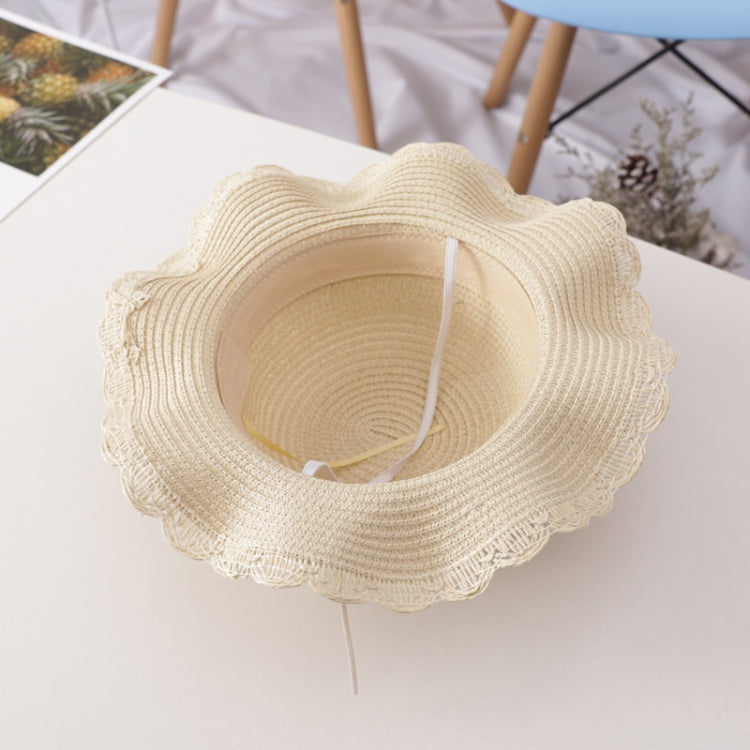 Girls straw sun hat with inner crown view and pom-pom trim, natural beige
