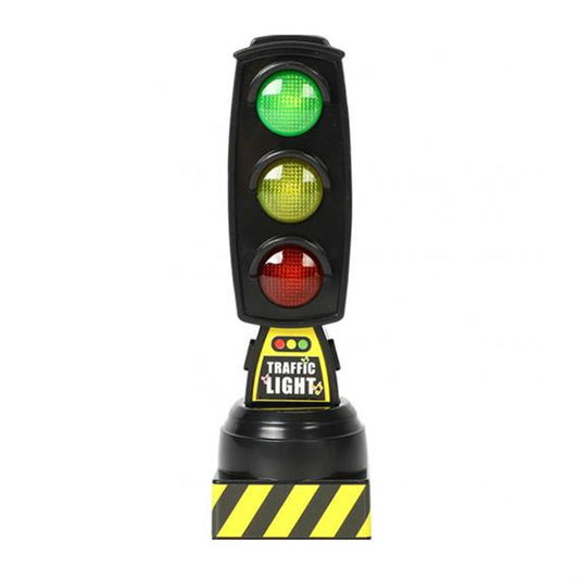 Black toy traffic light with green, yellow, and red signal lights