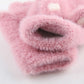 Kids light pink knitted half-finger gloves with plush cuff and visible thumb opening