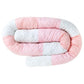 Cylindrical crib bumper with pink star fabric and pale padding panels