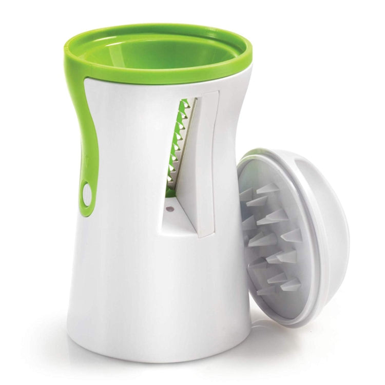 White and green spiral grater with side open grating drum and cutting slot.