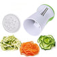 White and green spiral grater with round disc plate, showing veggie ribbon cuts.
