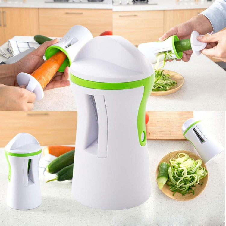 Kitchen countertop scene with multiple hands using the white and green spiral grater.