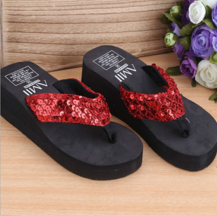 Red sequin wedge flip-flops with thong straps and black sole