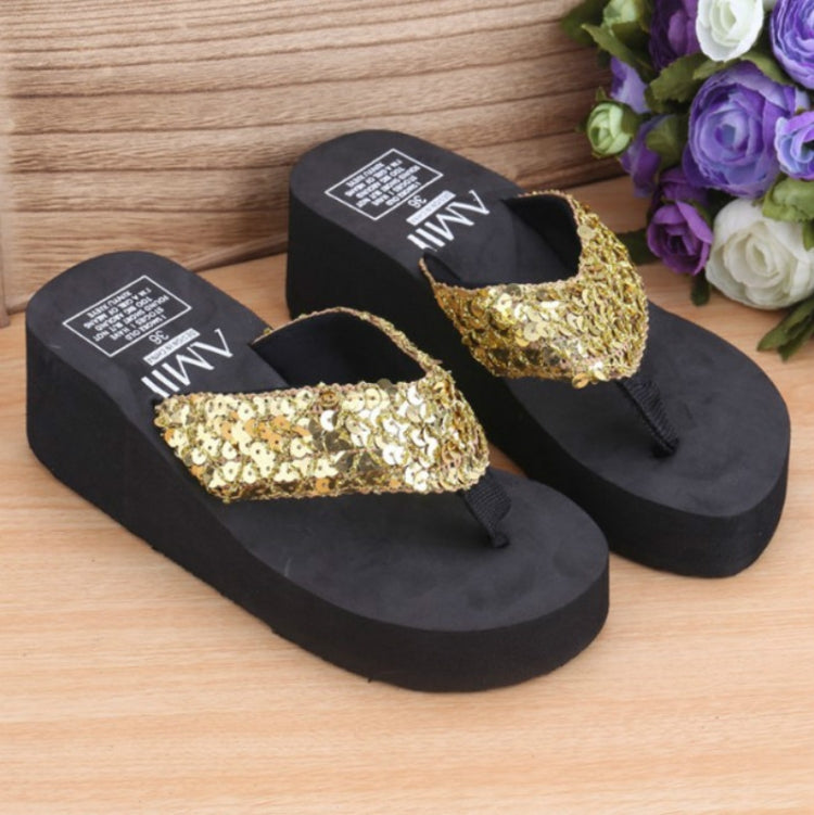 Sequin wedge flip-flop sandals with gold sequin strap and black platform base