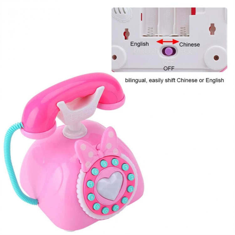 Pink musical retro telephone toy with heart dial and bilingual language selector switch