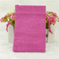 Pink linen drawstring gift bag with drawstring closure and gathered top.