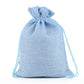 Linen jute drawstring gift bag in light blue, gathered top with light blue cords