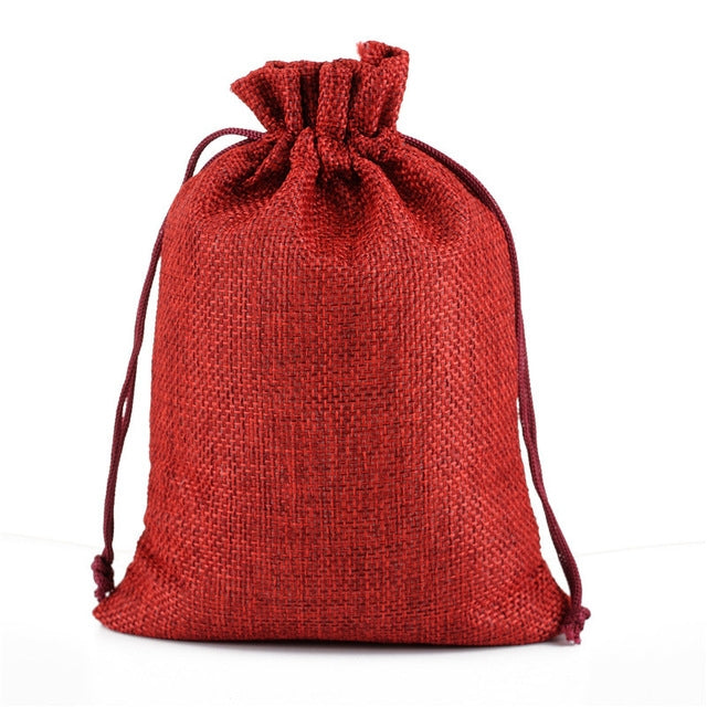 Linen jute drawstring gift bag in dark red, gathered top with matching drawstring cords