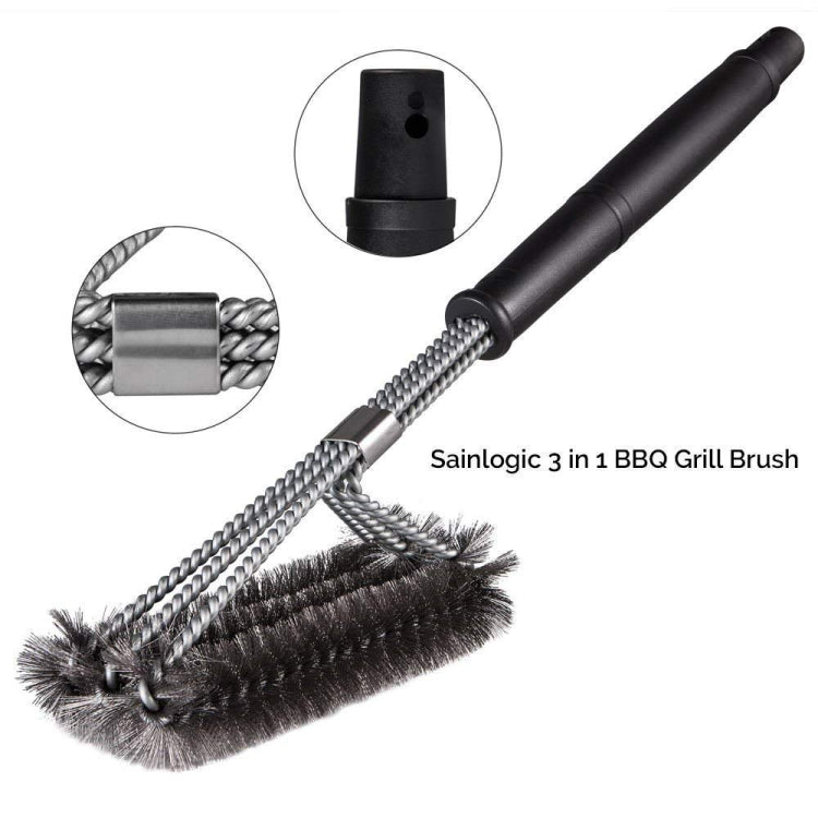 Barbecue grill brush with black handle, stainless wire loops, and thick bristle pad