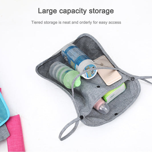 Baby stroller net storage bag with gray mesh sides and zip pouch for baby essentials