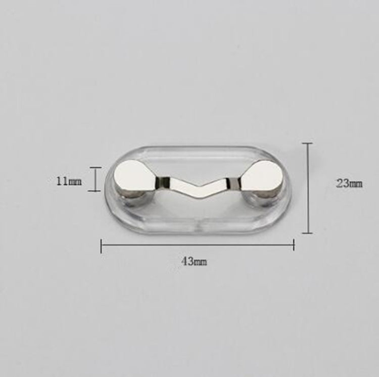 Clear oval magnetic glasses holder with black center pads and silver end caps
