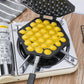 Non-stick QQ egg baking tray with multiple round molds and short handle