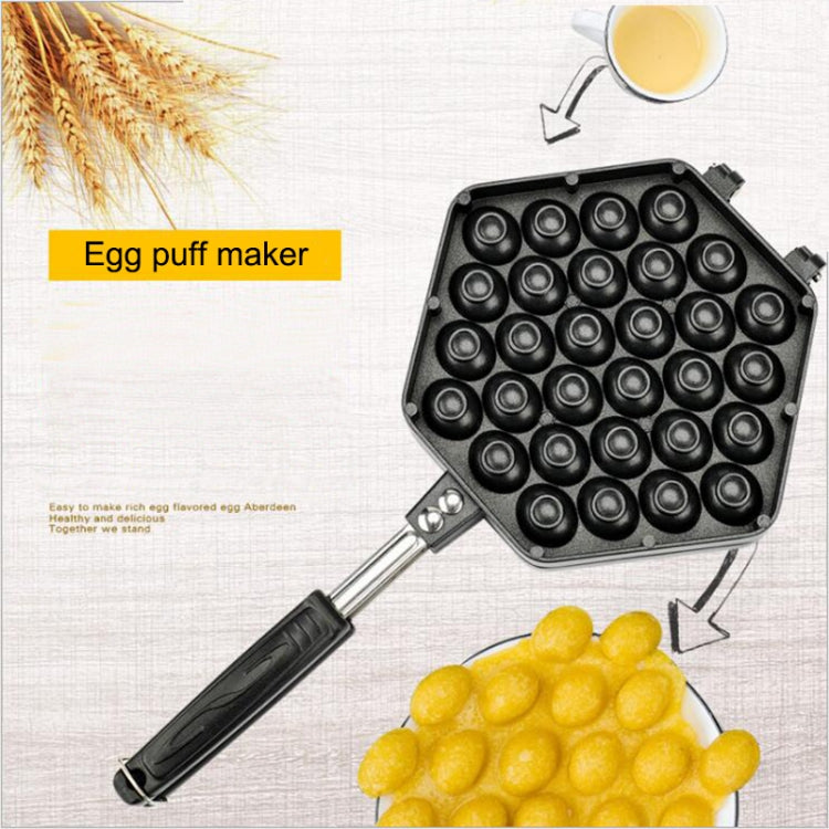 Non-stick egg puff bakeware mold tray with round cavities and handle, plus finished puffs