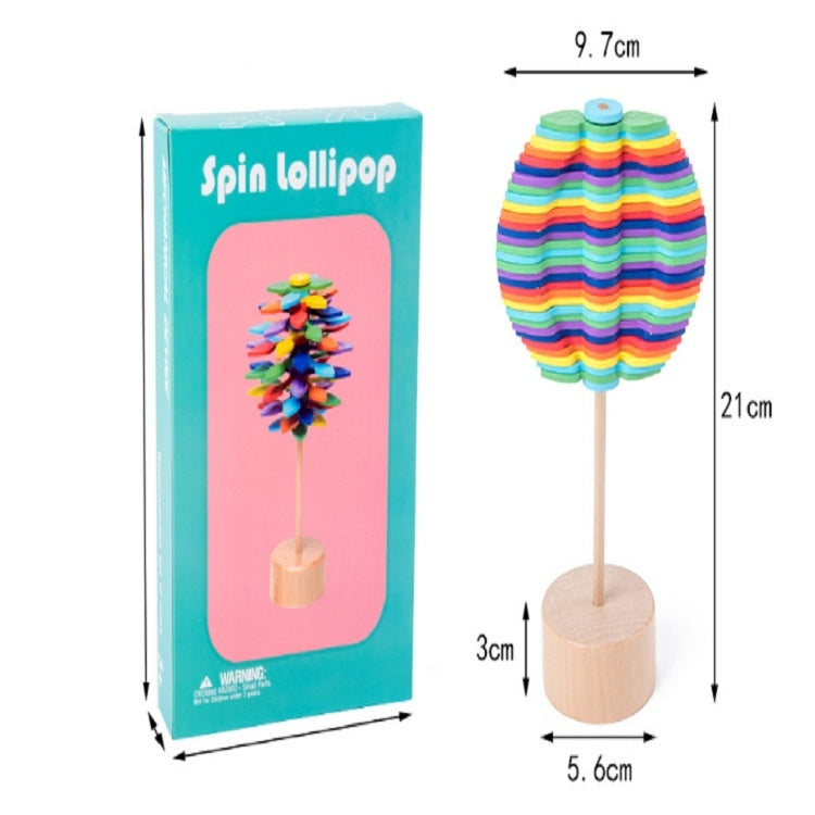 Boxed spin lollipop decompression toy with rainbow striped stacked-disc design and wooden base