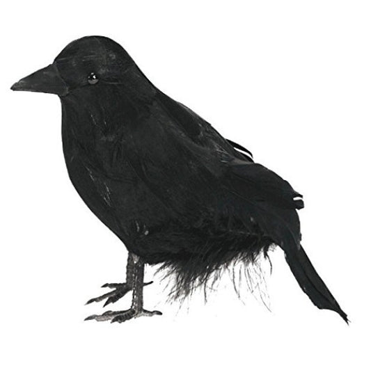 Black simulated crow decoration with beady eyes, standing on tiny feet and claws.