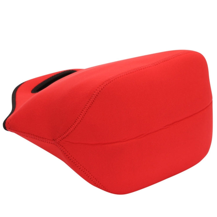 Red neoprene lunch bag side profile with oval handle loop and seam stitching