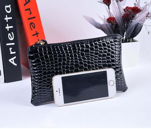 Black crocodile-pattern ladies clutch wallet with zip closure and phone card slot