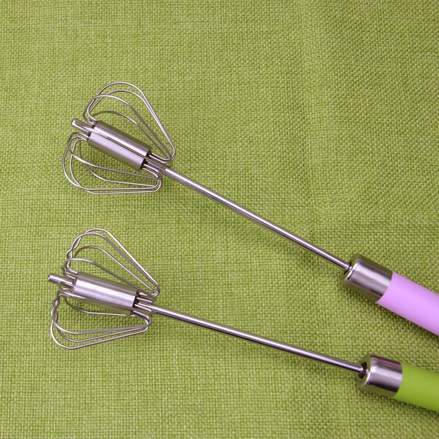 Rotary egg beater whisk with stainless beaters and purple handle