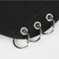 Black baseball cap brim with silver D-ring eyelets and grommet accents