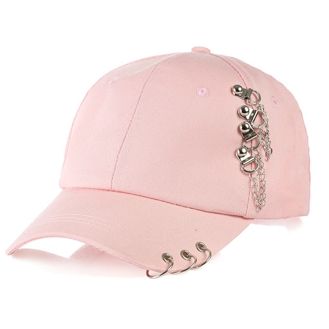 Pink adjustable baseball cap with silver chain hoop decoration on the side