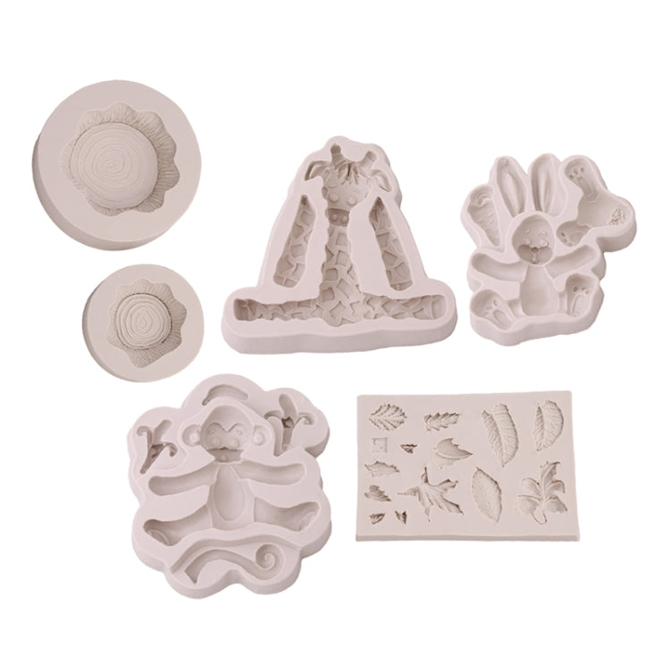 3D animal silicone mold set with lion, giraffe, rabbit, and monkey shapes