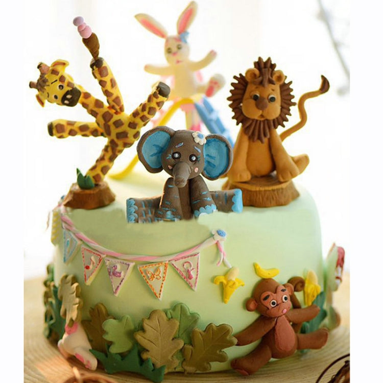 Colorful 3D animal cake with lion and other animal figurines