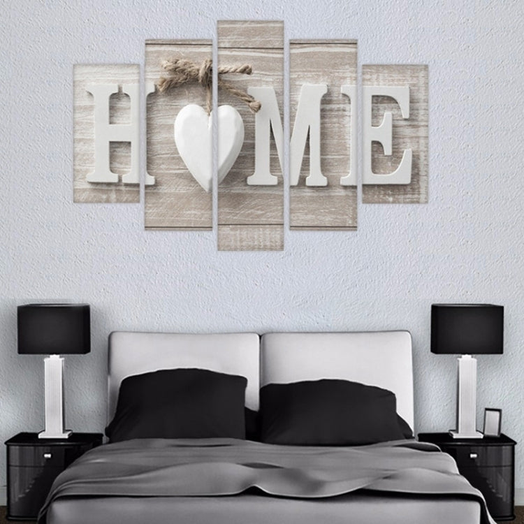 Five-panel HOME canvas wall art set with heart centerpiece and faded gray-white print