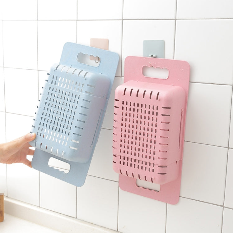 Dish drain basket set in blue and pink plastic with vented drying slots