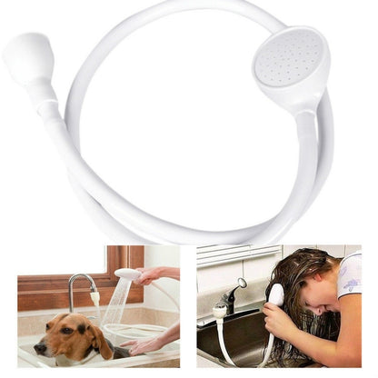 White sink nozzle with flexible hose and round spray head