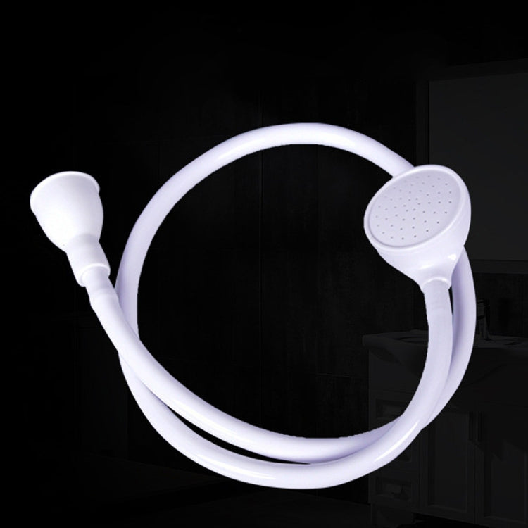 White handheld spray head and hose sink shower nozzle, looped view