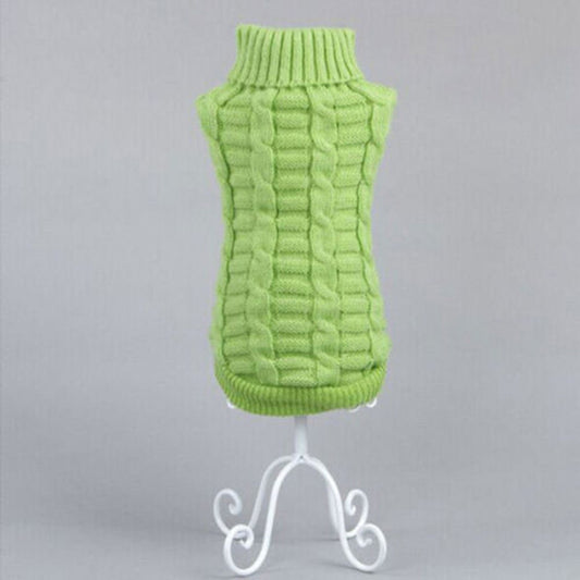 Green sleeveless turtleneck-style dog sweater with ribbed collar and hem.