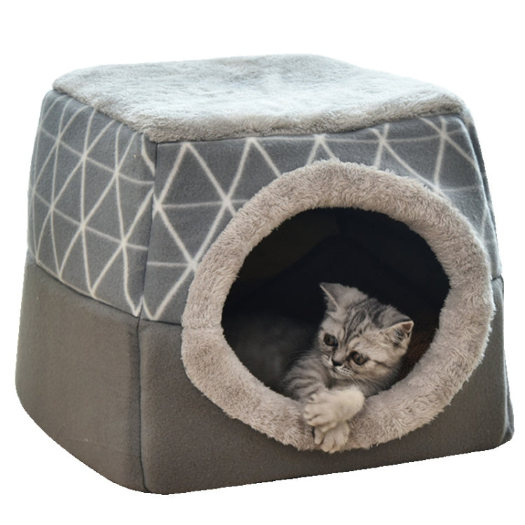 Gray closed cat bed cube with round plush entrance; cat sitting inside
