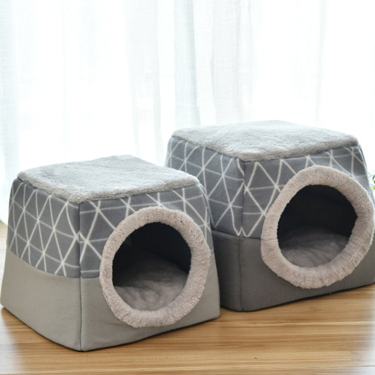 Pair of gray closed cat beds with geometric sides and round plush entrance openings