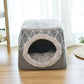 Gray closed cat bed with geometric sides and circular plush-lined entrance