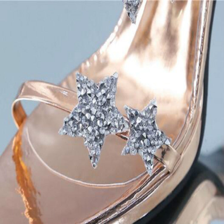 Champagne peep-toe high heel sandal with glittery star embellishments on upper