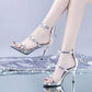 Silver peep-toe star heeled sandals with ankle strap and high stiletto heel