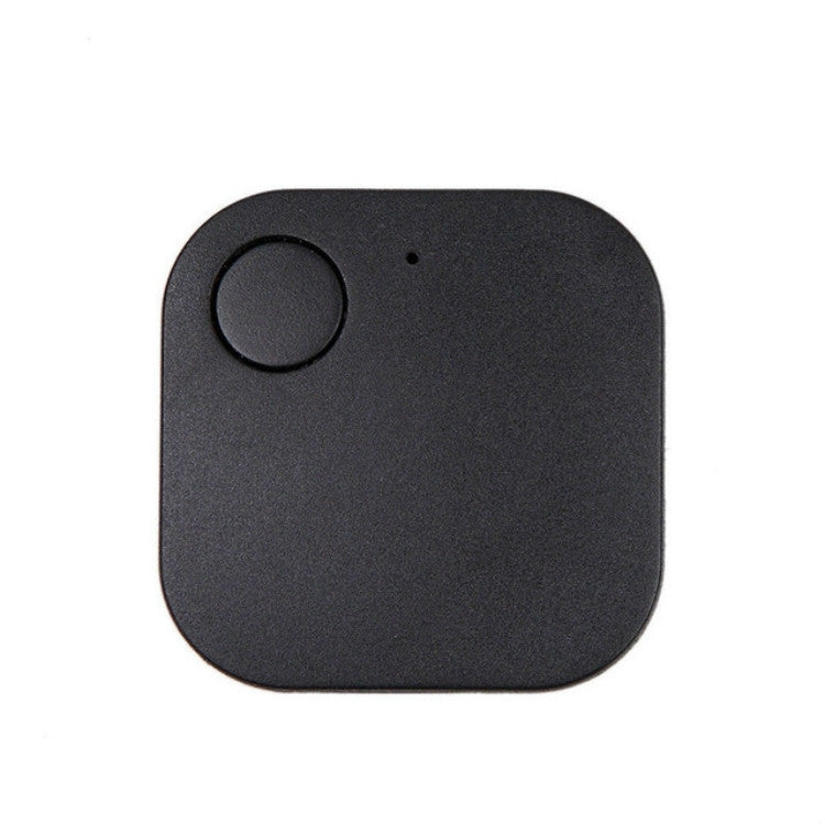 Black square Bluetooth anti-lost tracker, close-up of round button.