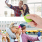 Green mini square Bluetooth key finder alarm tracker held in a hand.