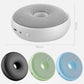 Compact air purifiers in black, green, and blue with perforated top grilles